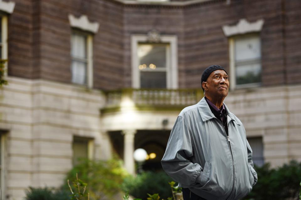 Photo of Laconia Smedley, 83, a former president of the Graham Court tenants association, poses for a photo at the courtyard of Graham Court Apartments in Harlem on 10/23/19. The historic apartment building  was the setting for the 1991 film "New Jack City."