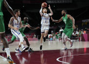 Italy's Niccolo Mannion (1), second right, drives to the basket during men's basketball preliminary round game against Nigeria at the 2020 Summer Olympics, Saturday, July 31, 2021, in Saitama, Japan. (AP Photo/Eric Gay)