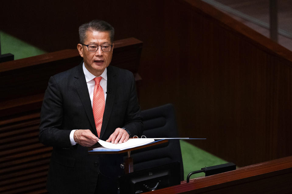 Hong Kong's Finance Secretary Paul Chan delivers the annual budget address at the Legislative Council in Hong Kong, Wednesday, Feb. 28, 2024. (AP Photo/Louise Delmotte)