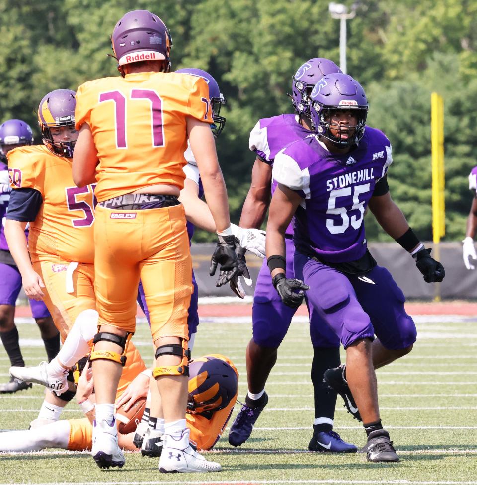 Stonehill's David Fuller-Williams sacks Post University quarterback Broghean McGovern during a game on Saturday, Sept. 10, 2022. 