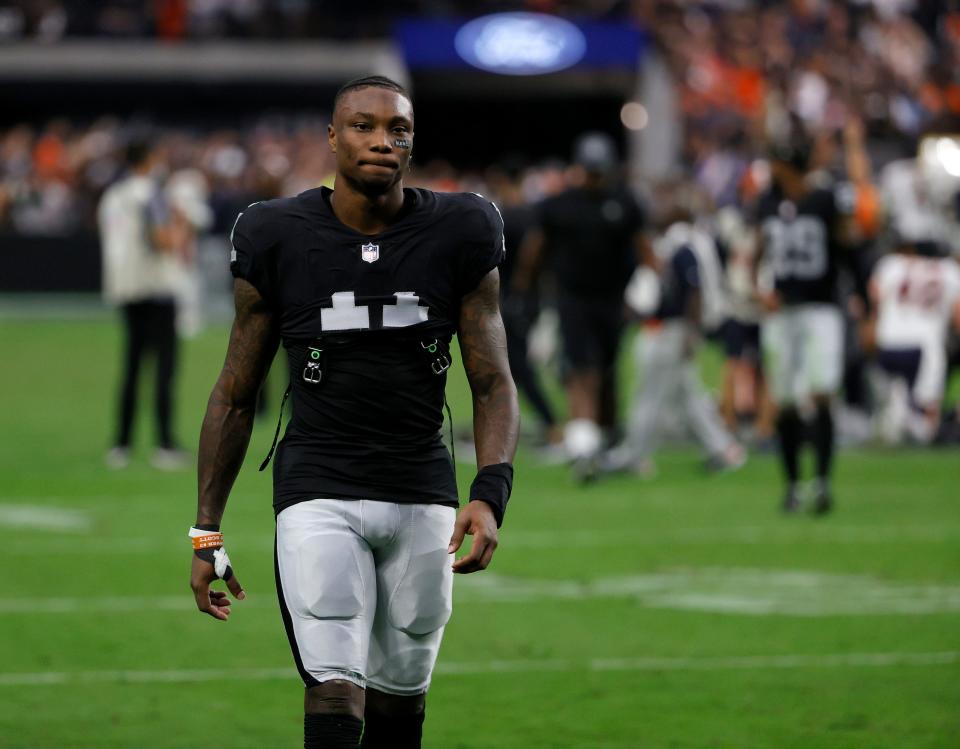 Wide receiver Henry Ruggs III #11 of the Las Vegas Raiders walks off the field after the team's 20-9 loss to the Chicago Bears at Allegiant Stadium on October 10, 2021 in Las Vegas, Nevada.
