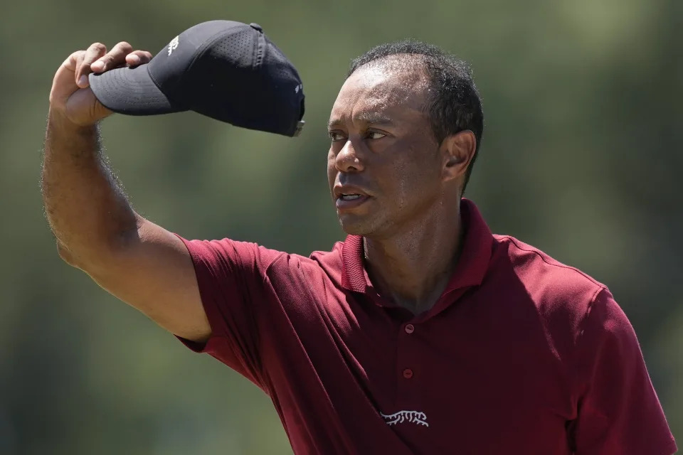 Tiger Woods waves after his final round at the Masters golf tournament at Augusta National Golf Club Sunday, April 14, 2024, in Augusta, Ga. (AP Photo/David J. Phillip)