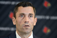 University of Louisville interim athletic director Josh Heird speaks to reporters following a meeting of the University Board of Trustees and the Louisville Athletic Association board, Wednesday, Jan. 26, 2022, in Louisville, Ky. The university and men’s basketball coach Chris Mack have mutually agreed to part ways, the school announced. Assistant Mike Pegues has been named interim coach for the remainder of the Cardinals' season. (AP Photo/Timothy D. Easley)