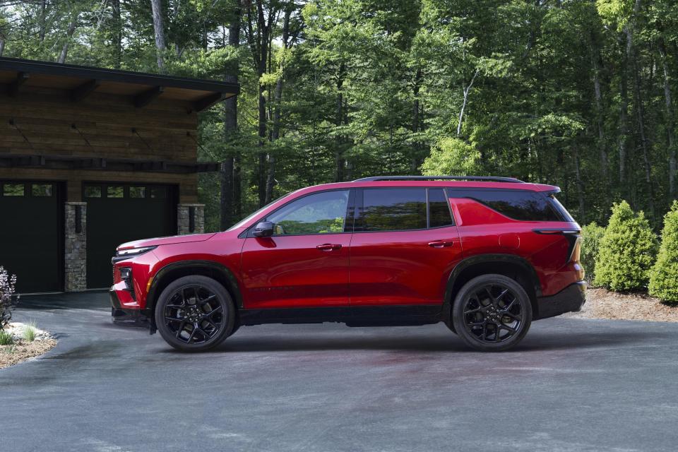 This photo provided by Chevrolet shows the redesigned 2024 Traverse. An ideal three-row SUV for larger families, the Traverse has loads of room as well as many new helpful technology features. (General Motors via AP)