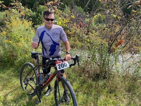 McKean Township resident Ronnie Graff poses with his off-road bicycle during a September 2021 race at Emporium in Cameron County. Graff, 71, and Rick Rodland, 70, of Harborcreek Township are the only two athletes who have competed in every event of the Highmark Quad Games since the event began in 1983.