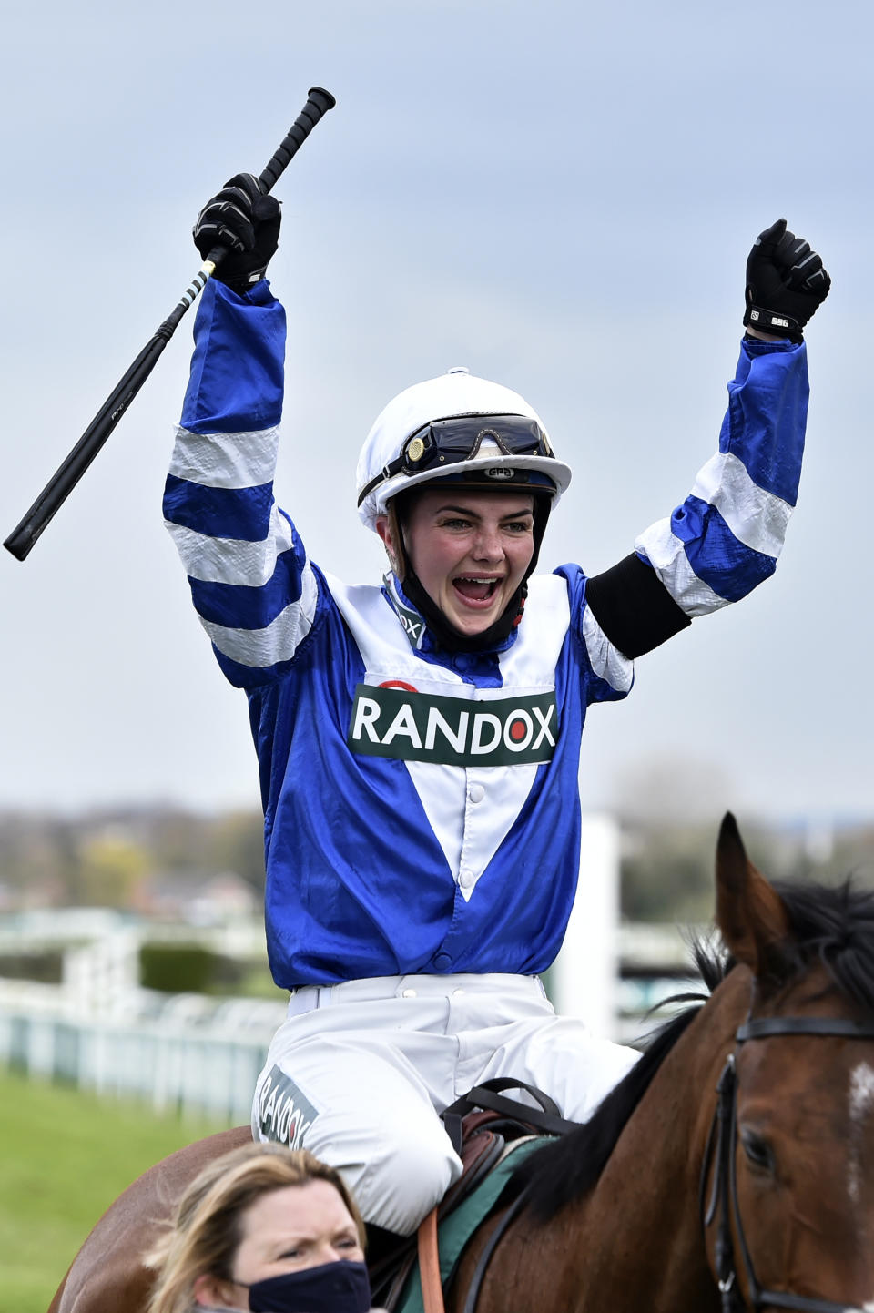 Megan Nicholls riding Knappers Hill celebrates after winning the Weatherbys nhstallions.co.uk Standard Open NH Flat Race on the third day of the Grand National Horse Racing meeting at Aintree racecourse, near Liverpool, England, Saturday April 10, 2021. (AP Photo/Scott Heppell, Pool) (Peter Powell/Pool via AP)