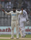 New Zealand's Ajaz Patel celebrates the dismissal of India's Jayant Yadav during the day two of their second test cricket match with India in Mumbai, India, Saturday, Dec. 4, 2021.(AP Photo/Rafiq Maqbool)