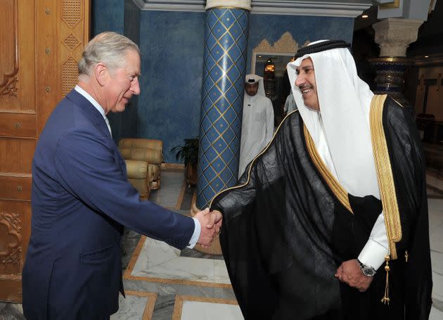 Prince Charles shakes hands with former Qatari prime minister Sheikh Hamad Bin Jassim, at his residence outside Doha, Qatar. (Photo: John Stillwell via PA Wire/PA Images)