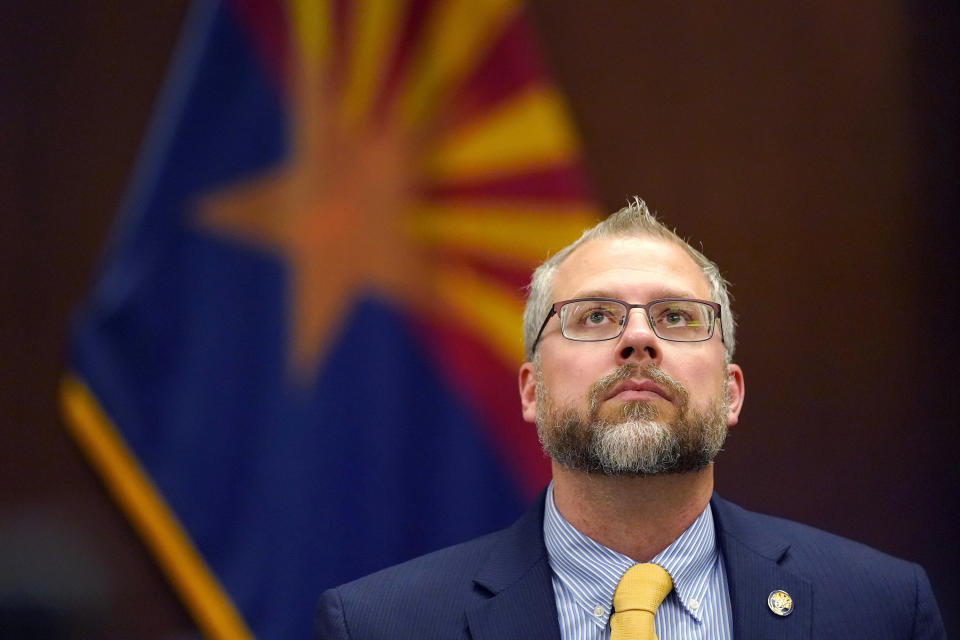 Pinal County Attorney Kent Volkmer listens to complaints while addressing election day ballot shortages in Pinal county, Wednesday, Aug. 3, 2022, in Florence, Ariz. (AP Photo/Matt York)