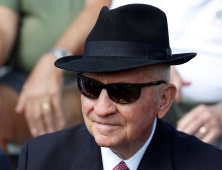 FILE PHOTO: Billionaire businessman and former U.S. presidential candidate H. Ross Perot watches a demonstration by U.S. Navy SEAL Team 18 members at the National Navy UDT-SEAL Museum in Fort Pierce