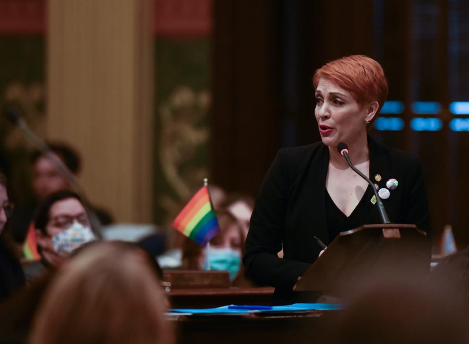 Rep. Emily Dievendorf, D-Lansing, addresses fellow legislators Wednesday, March 8, 2023, at the state Capitol in Lansing, before the Michigan House voted to expand the state's Elliott-Larsen Civil Rights Act to include protections for LGBTQ+ people.
