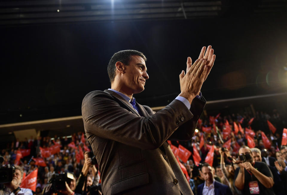 FILE - In this Nov. 1, 2019, file photo, Spain's caretaker Prime Minister and socialist candidate Pedro Sanchez applauds socialist followers during a general election campaign rally in Pamplona, northern Spain. Sanchez's Socialists won Spain's national election on Sunday but large gains by the upstart far-right Vox party appear certain to widen the political deadlock in the European Union’s fifth-largest economy. (AP Photo/Alvaro Barrientos, File)