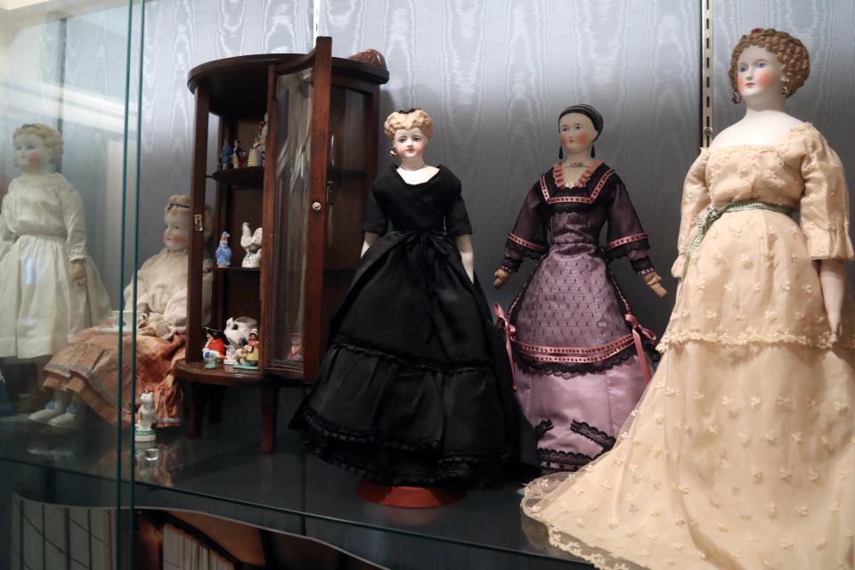 Various Parian-style bisque dolls from the late 1800s are on display at the Doll Museum in Worthington.