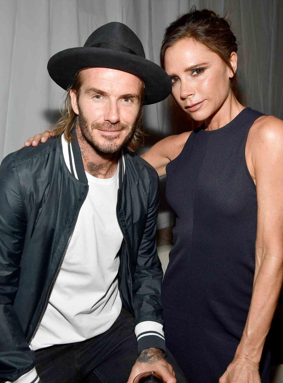 David Beckham and Victoria Beckham at the grand opening of the new Ken Paves Salon hosted by Eva Longoria on October 23, 2017 in Los Angeles, California