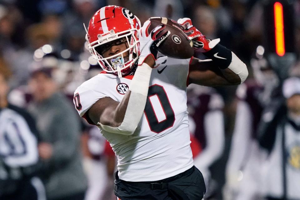 Georgia tight end Darnell Washington (0) catches a short pass against Mississippi State during the first half of an NCAA college football game in Starkville, Miss., Saturday, Nov. 12, 2022. (AP Photo/Rogelio V. Solis)