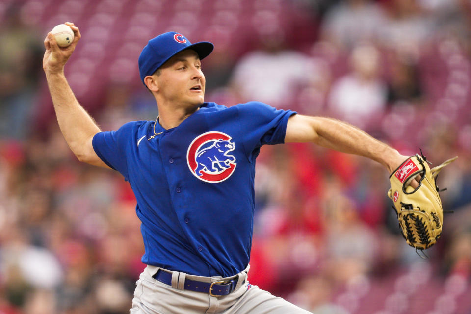 Chicago Cubs starting pitcher Hayden Wesneski throws against the Cincinnati Reds in the first inning of a baseball game in Cincinnati, Tuesday, April 4, 2023. (AP Photo/Jeff Dean)