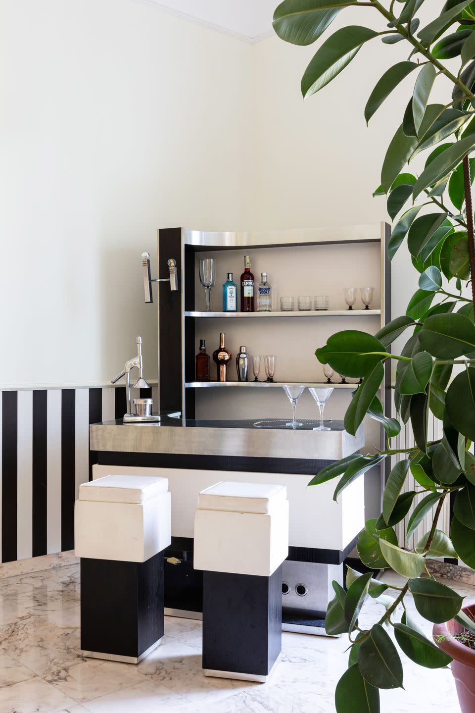 apartment of anna masello and giovanni izzo in naples photography by monica spezia living inside bar area