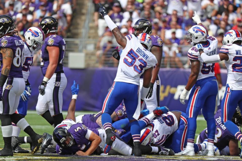 Sep 11, 2016; Baltimore, MD, USA; Buffalo Bills linebacker Zach Brown (53) signals that his team has recover a fumble by Baltimore Ravens quarterback Joe Flacco (5) at M&T Bank Stadium. Mandatory Credit: Mitch Stringer-USA TODAY Sports