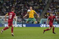 Australia's Mitchell Duke controls the ball during the World Cup group D soccer match between Australia and Denmark, at the Al Janoub Stadium in Al Wakrah, Qatar, Wednesday, Nov. 30, 2022. (AP Photo/Thanassis Stavrakis)