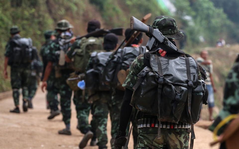 PDF and fighters from other local resistance groups march in Tagu, Tanintharyi Region, Myanmar