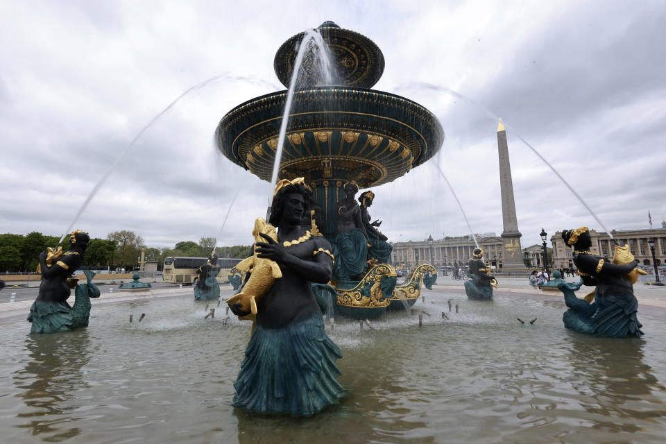 FILE - A fountain and the obelisk of the Place de la Concorde are pictured, Thursday, April 11, 2024 in Paris. Place de la Concorde is where Louis XVI and Marie Antoinette were guillotined in 1793. It's also been home to the Luxor Obelisk for nearly 200 years. This summer B-boys and B-girls as well BMX freestylers, 3-on-3 basketballers and skateboarders will compete there. (AP Photo/Aurelien Morissard, File)