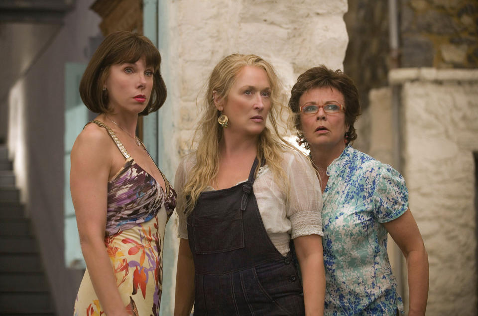 A lot of the comedy in Mamma Mia! comes from the sheer ridiculousness of seeing some of our greatest movie stars burst into song to the tune of ABBA with varying degrees of success. But the silliness and joy of Meryl Streep's performance as Donna while she tries to balance three exes and her daughter's wedding will win you over. 