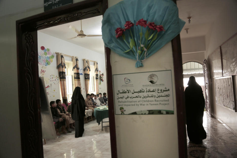 Boys listen during an Arabic language class at a rehabilitation center for former child soldiers in Marib, Yemen, in this July 28, 2018, photo. Nearly 200 former child soldiers have come through the Saudi-funded center, where they try to learn how to deal with the traumas and horrors they saw in combat. Many suffer from aggressive behavior and panic attacks. (AP Photo/Nariman El-Mofty)