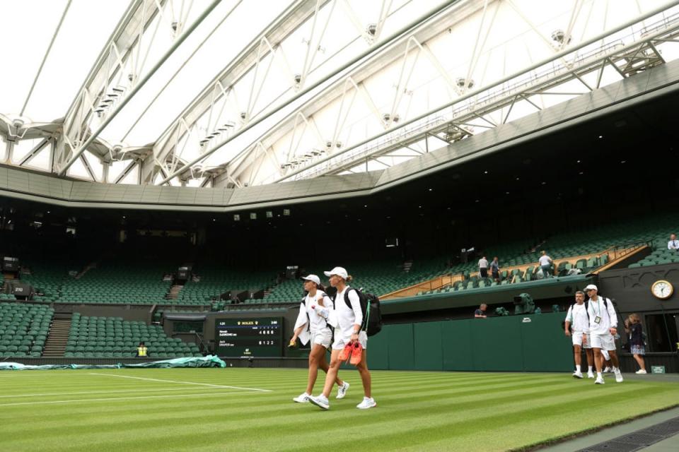 In another break from tradition, some players were allowed  to practice on Centre Court before the tournament (Getty Images)