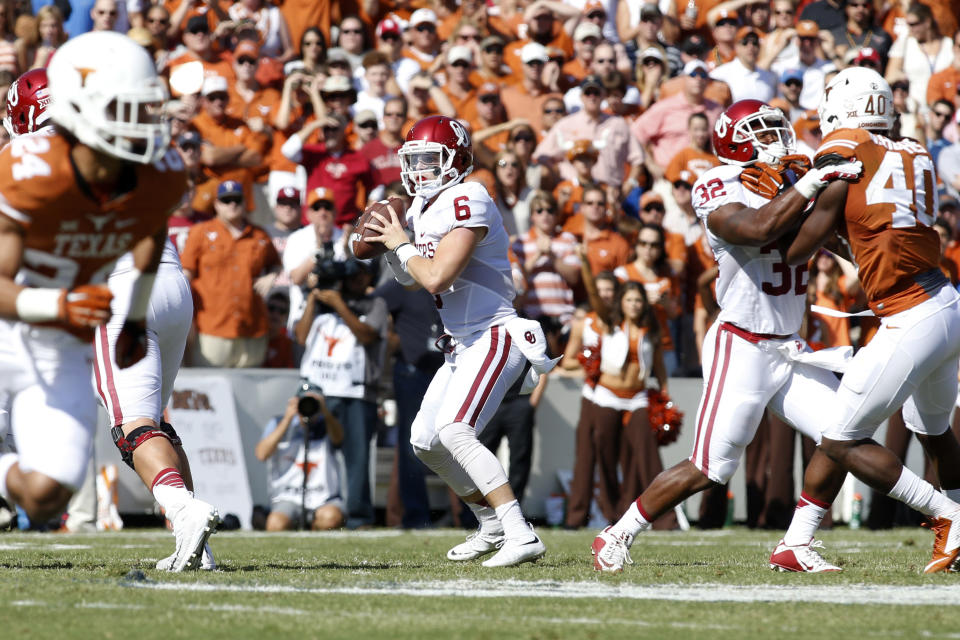 Oct. 10, 2015; Dallas, Texas; Oklahoma Sooners quarterback Baker Mayfield (6) drops back to pass in the first quarter against the Texas Longhorns during the Red River rivalry at Cotton Bowl Stadium. Tim Heitman-USA TODAY Sports