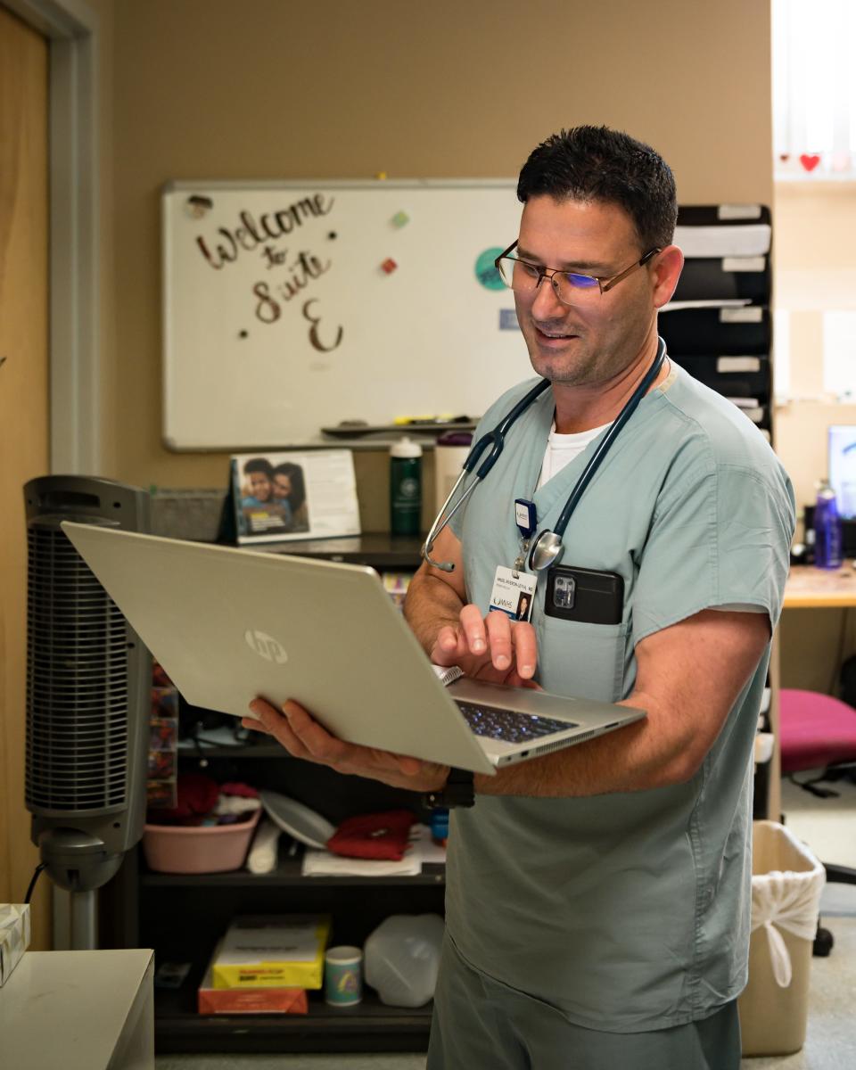 Angel Riveron Leyva, MD, a member of the St. Elizabeth Family Medicine Residency Program, stands inside the Sister Rose Vincent Family Medicine Center at 120 Hobart St in Utica, NY on Tuesday, July 25, 2023.