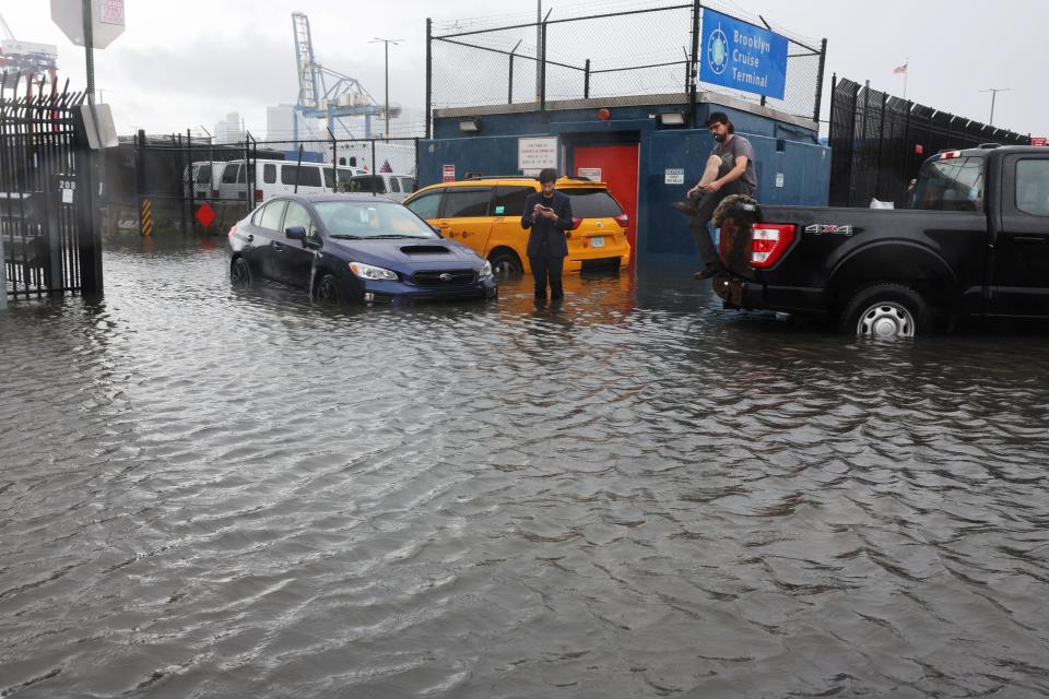 Cars sit stuck in the flooded streets in the Red Hook neighborhood on September 29, 2023 in the Brooklyn borough of New York City. Much of the Northeast is experiencing severe flooding after heavy rains swept through the area this morning.