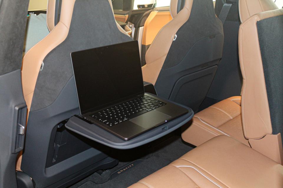 A tray table in the backseat of the Lucid Gravity SUV.