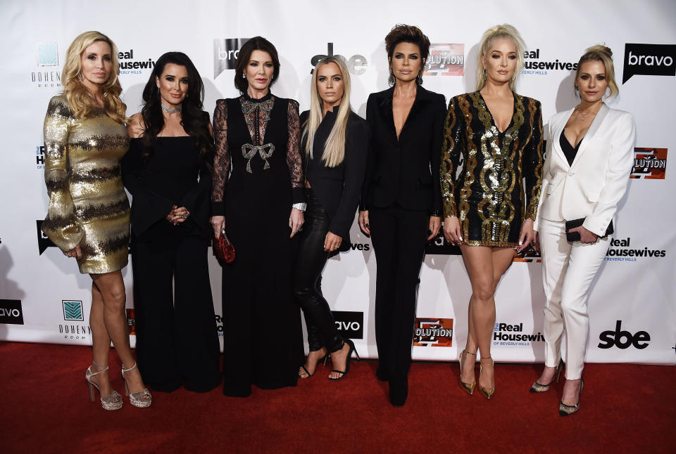 Camille Grammer, Kyle Richards, Lisa Vanderpump, Teddi Jo Mellencamp, Lisa Rinna, Erika Jayne, and Dorit Kemsley arrive at the premiere party for Bravo’s <em>The Real Housewives of Beverly Hills</em> Season 8. (Photo: Amanda Edwards/WireImage)