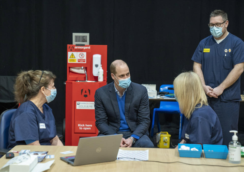 Prince William visits King's Lynn Corn Exchange Vaccination Centre on Feb. 22 in King's Lynn, England. The duke spoke to NHS staff and volunteers and heard more about their experiences of being involved in the vaccination program.  (Photo: WPA Pool via Getty Images)