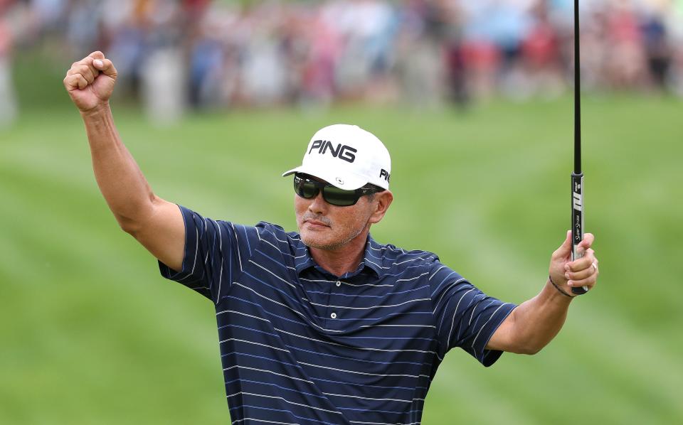 Ken Tanigawa celebrates after scrambling for a par on the 18th hole to help him win the 2019 Senior PGA Championship at Oak Hill Country Club.