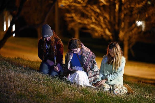 PHOTO: Children gather outside the Covenant School building at the Covenant Presbyterian Church following a shooting, in Nashville, Tennessee, March 27, 2023. (Brendan Smialowski/AFP via Getty Images)