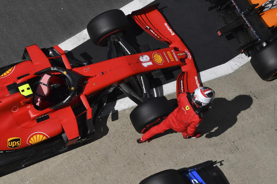 Ferrari driver Charles Leclerc of Monaco walks away from his car after finishing fourth in the qualifying session for the British Formula One Grand Prix at the Silverstone racetrack, Silverstone, England, Saturday, Aug. 1, 2020. The British Formula One Grand Prix will be held on Sunday. (Ben Stansall/Pool via AP)