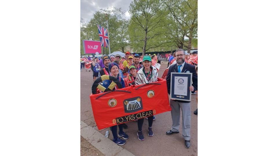 Group of people dressed as a bus running the London Marathon