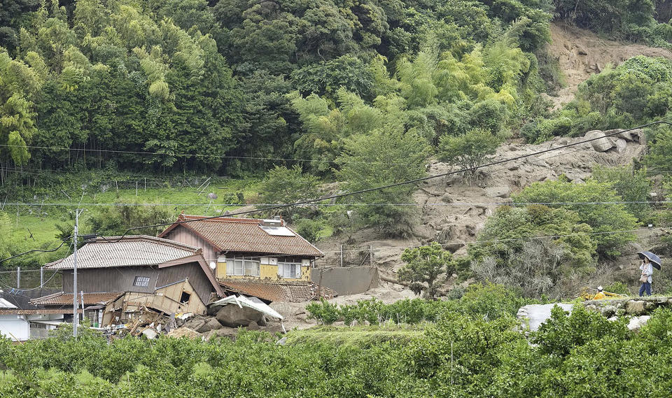 This shows the site of a landslide in Karatsu, Saga prefecture, southern Japan Monday, July 10, 2023. Torrential rain has been pounding southwestern Japan, triggering floods and mudslides. (Kyodo News via AP)