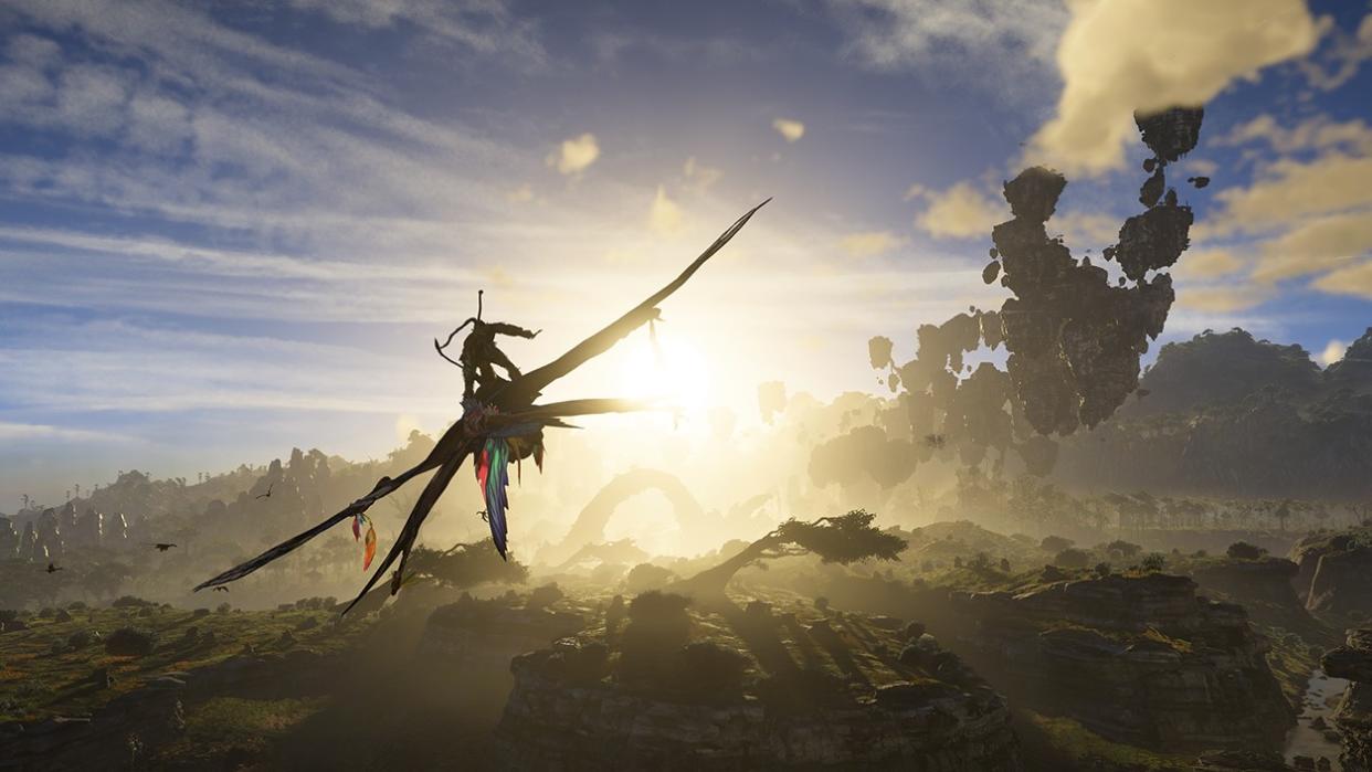  Still from the video game Avatar: Frontiers of Pandora. A Na'vi (blue humanoid with long dark hair) is riding on top of large flying beast off into the sunset. 