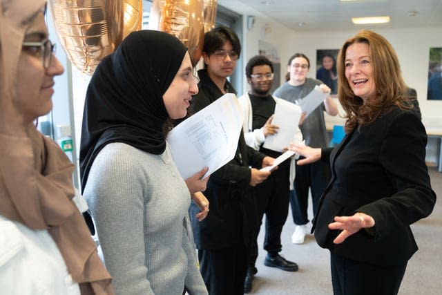 Education Secretary Gillian Keegan meets pupils as they open their GCSE results at Paddington Academy in London