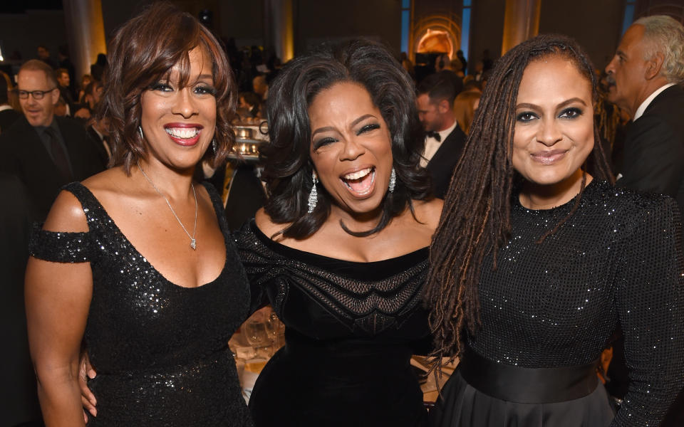 Gayle King, Oprah Winfrey and director Ava DuVernay pose for a photo at the Golden Globe Awards in Beverly Hills, Calif., on Sunday. (Michael Kovac/Getty Images for Moet & Chandon)