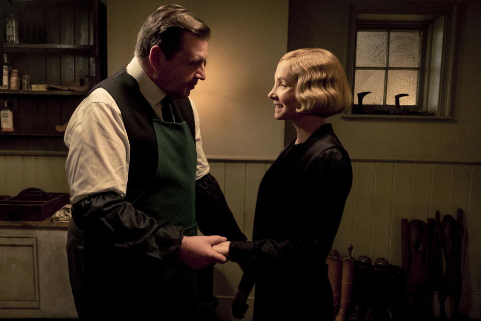 This image released by Focus Features shows Brendan Coyle as John Bates, left, and Joanne Froggatt as Anna Bates stars as Andy in "Downton Abbey". The film will be released Sept. 13, 2019, in the United Kingdom and on Sept. 20 in the United States. (Jaap Buitendijk/Focus Features via AP)