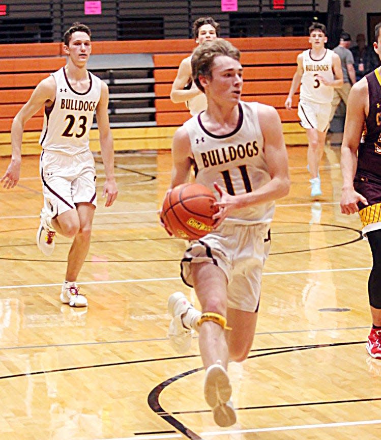 De Smet's Gannon Gruenhagen heads to the basket on a breakaway during their SoDak 16 Class B state-qualifying boys basketball game against Crazy Horse on Tuesday, March 7, 2023 in the Huron Arena. De Smet won 89-54.