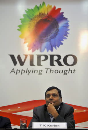 T.K. Kurien, Chief Executive Officer of Wipro Ltd, India's third-biggest software services exporter, attends the quarterly results at the Wipro headquarters in the southern Indian city of Bengaluru April 21, 2015. REUTERS/Abhishek N. Chinnappa