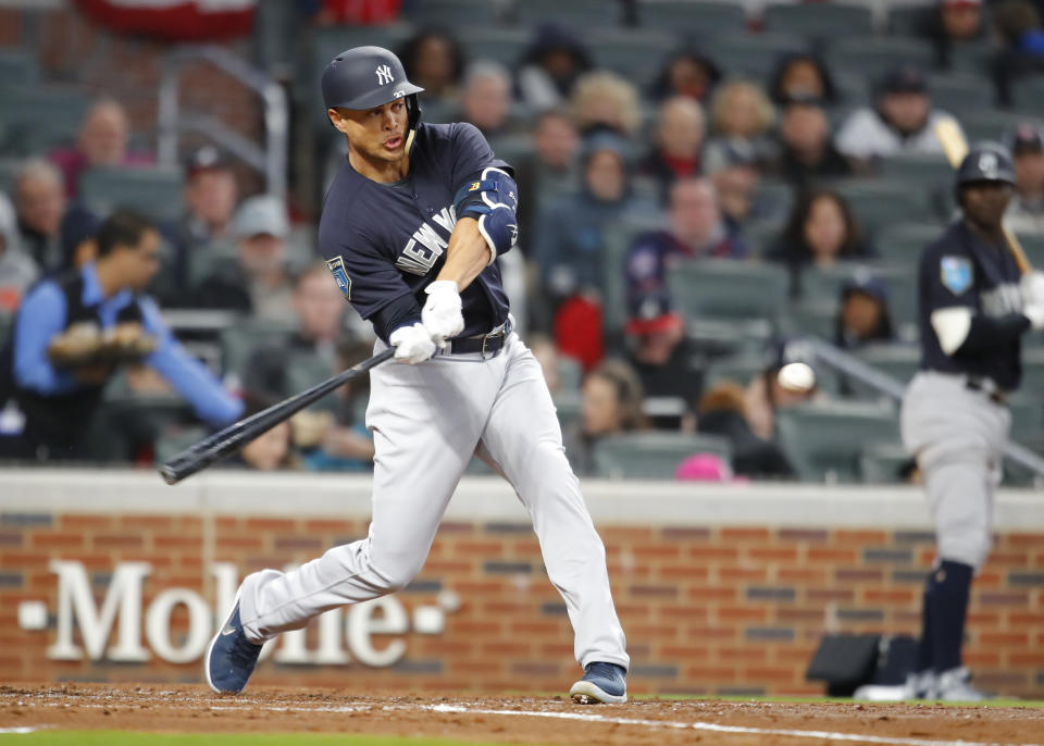 Giancarlo Stanton is a real threat to hit 60+ homers now in Yankee Stadium (AP Photo).