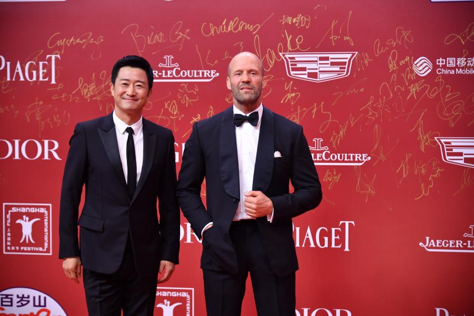 SHANGHAI, CHINA - JUNE 09: Actors Wu Jing (L) and Jason Statham attend the opening ceremony of the 25th Shanghai International Film Festival at Shanghai Grand Theatre on June 9, 2023 in Shanghai, China. (Photo by VCG/VCG via Getty Images)