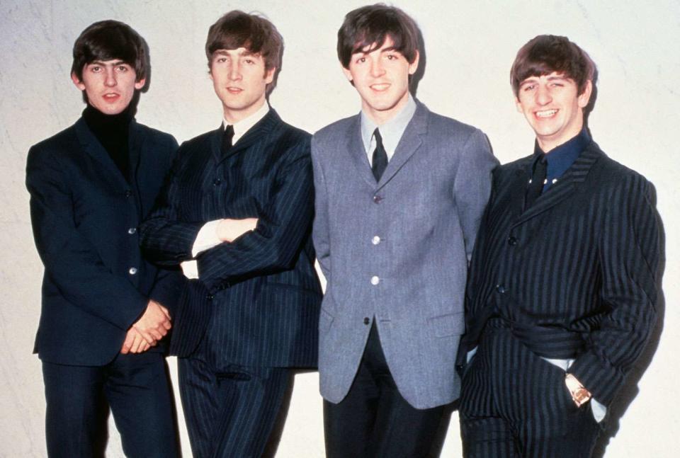 <p>getty</p> From left to right: George Harrison, John Lennon, Paul McCartney and Ringo Starr