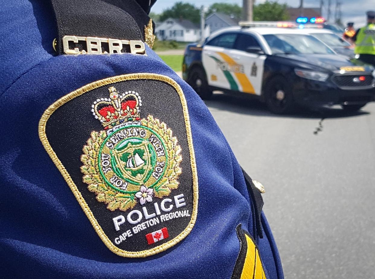 Cape Breton Regional Police say two men are facing charges after police seized 2.2 kilograms of cocaine and 380 grams of ecstasy, along with cash and a pickup truck. (Tom Ayers/CBC - image credit)
