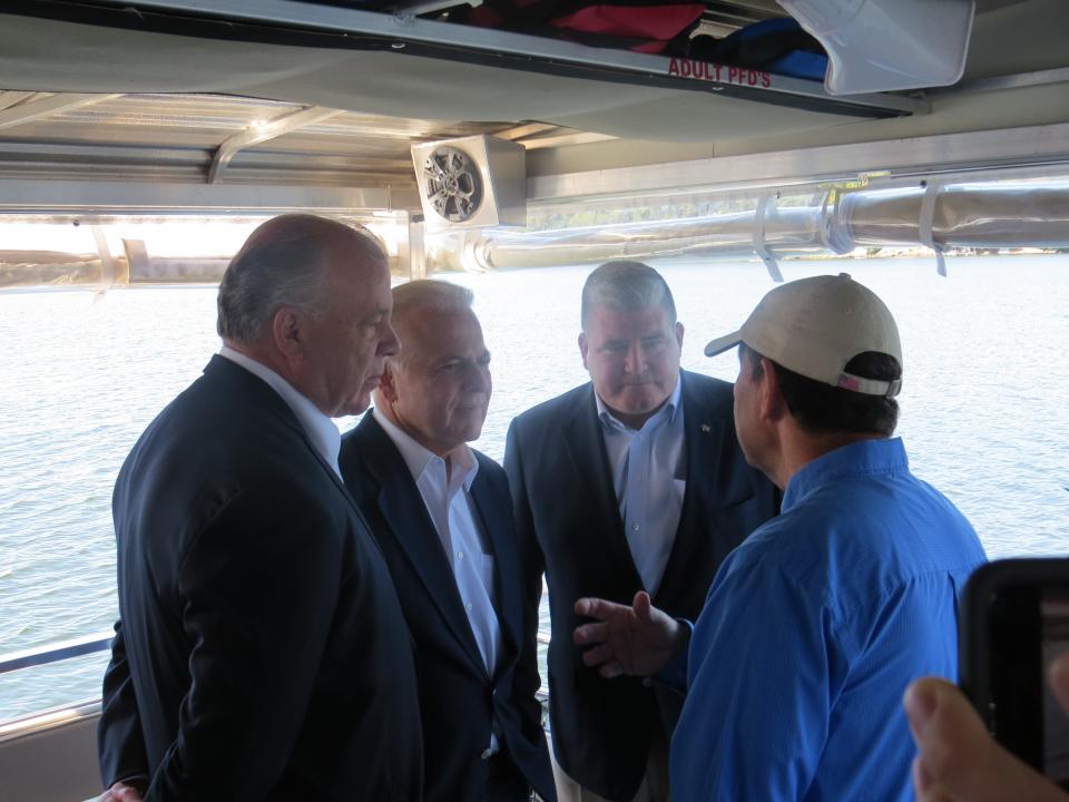 From left, New Jersey's then-state Senate President Stephen Sweeney, with senators Joseph Pennacchio and Steve Oroho aboard the Lake Hopatcong Foundation's Floating Classroom in September 2019. The legislators spoke to foundation President Marty Kane about algae blooms that prevented swimming there for most of the summer.